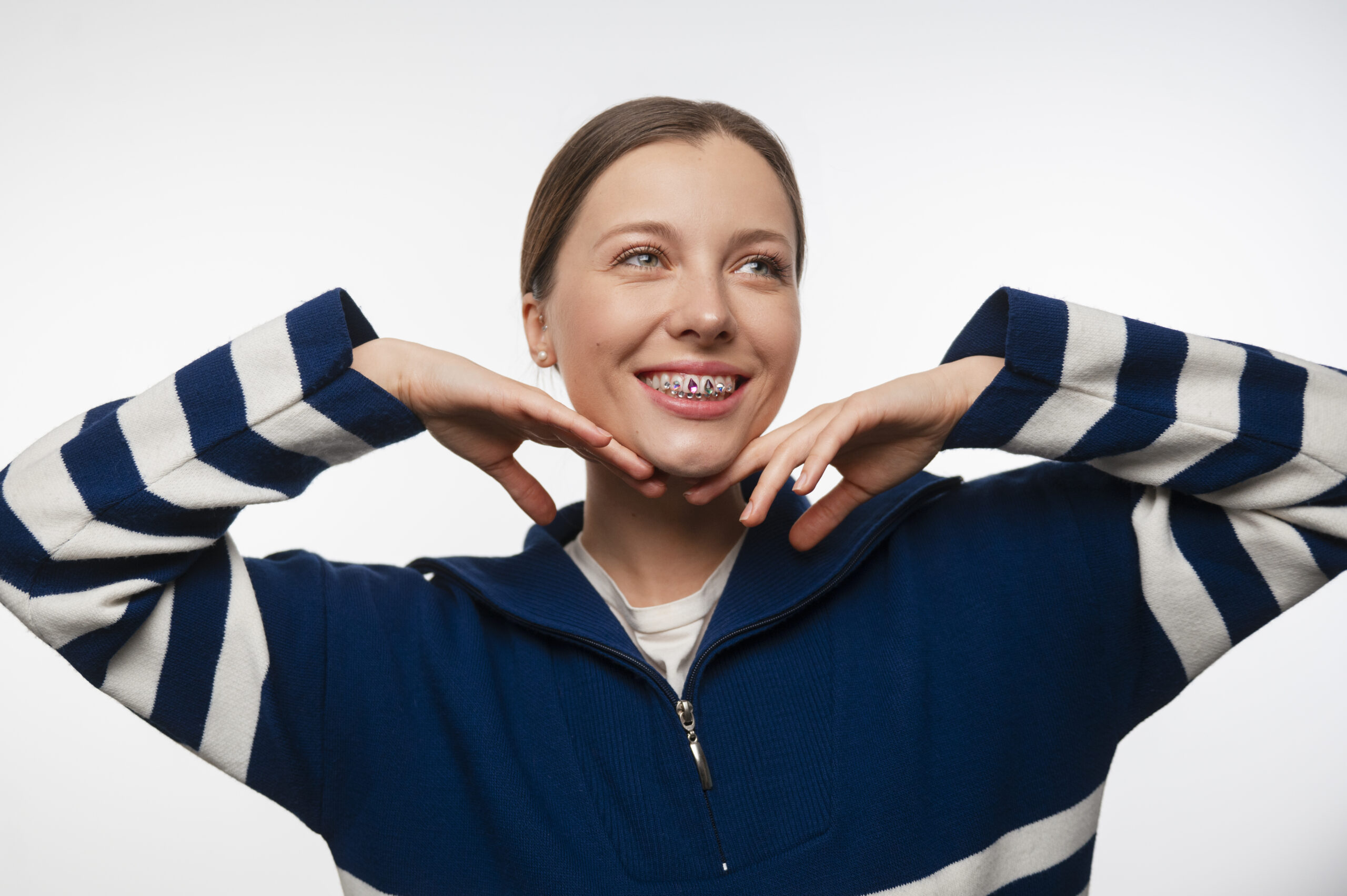front-view-woman-posing-with-dental-gems