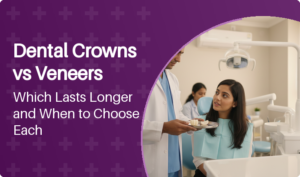 Dentist comparing a dental crown and veneer with a patient during consultation